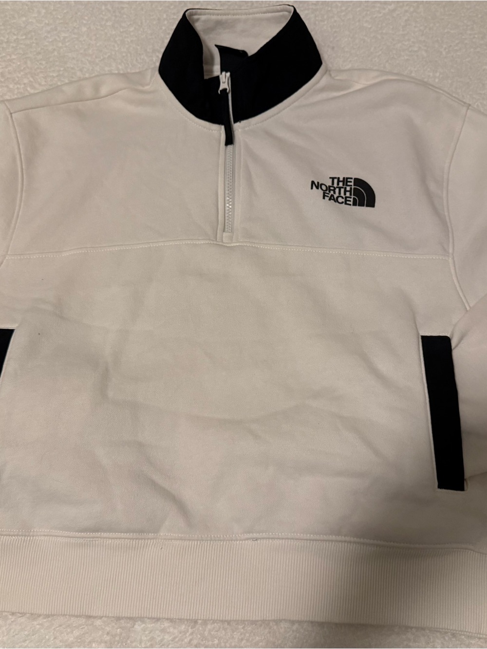 The North Face women’s White Pullover Quarter-Zip with Black Trim